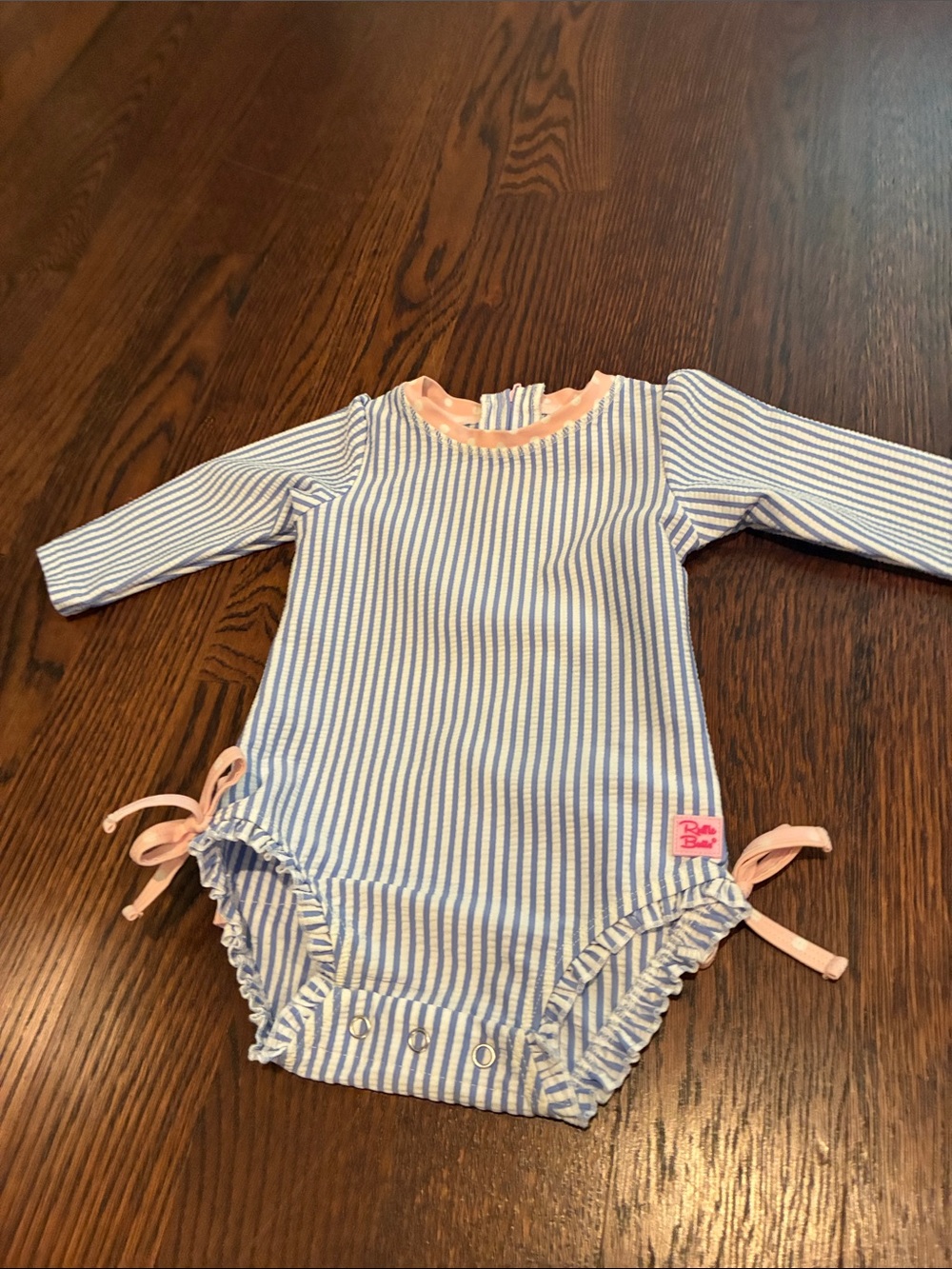 Ruffle Butts Blue & White Striped Long-Sleeve Swim Bodysuit with Pink Trim